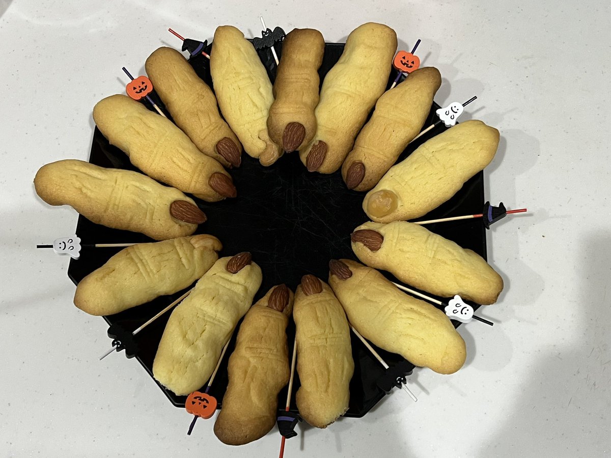 ReginaRed's tweet photo. All right, it’s Halloween baking time (yesterday). My witch fingers looked more original and creepy in unbaked form 😂😂😂 baked they got a bit fatter 😂😂😂 🎃 👻 https://t.co/CeXTPE0NqJ
