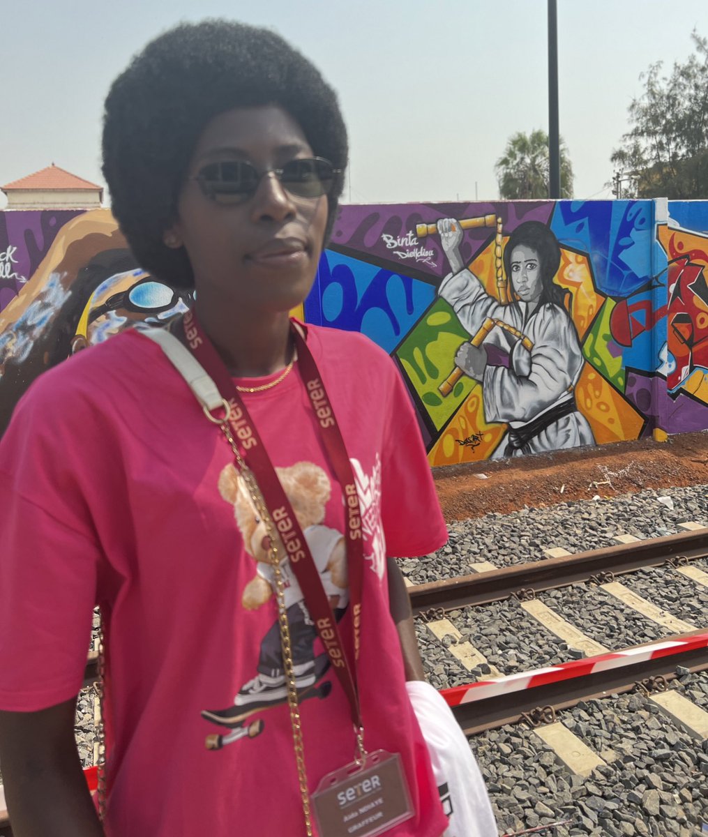 SportEnCommun's tweet photo. Inauguration d’un mur collaboratif réalisé par 15 artistes du #Sénégal, #Bénin et de #Guinée en présence de la délégation des JOJ #Dakar2026 et du Ministre des Sports du Sénégal @YDiatara 🇸🇳

« L’objectif, c’est d’honorer nos athlètes de leur vivant »

#DakarEnJeux #YouthOlympics https://t.co/aQ3wcuNhQz