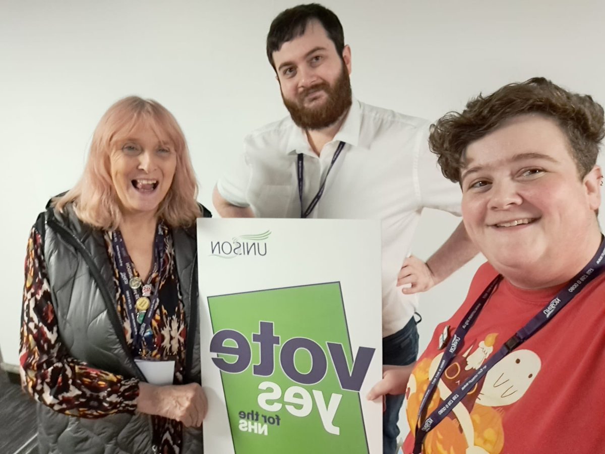 heron_pat's tweet photo. Thanks Nate in orange &amp; Ryan for supporting #VoteYesForNHS hear at #undmc22 great to listen to the support for our health workers &amp; @UNISONOurNHS https://t.co/msVyl4Ttw2
