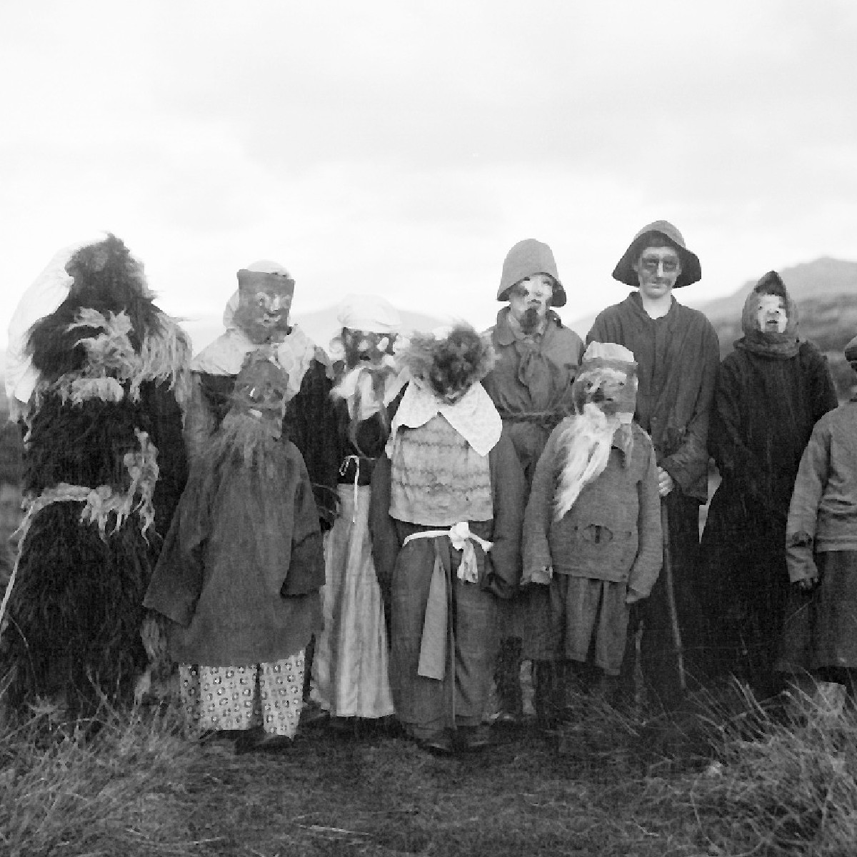 Halloween on South Uist, 1932 looked pretty terrifying. Children made homemade costumes from sheepskins, haystack wigs, scraped-out skulls and sheep ears! One boy spent an entire day peeling the skin from a sheep skull to make his mask! (📸 Canna House Photographic Collection)