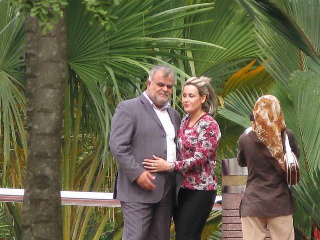 AlinejadMasih's tweet photo. Women are getting killed in Iran for not wearing hijab but see how the top Revolutionary Guards general &amp; current transport minister, Rostam Qasemi enjoys freedom with his unveiled girlfriend in Malaysia.
The hypocrite regime is killing teenagers for #WalkingUnveiled.
#MahsaAmini https://t.co/XUXwzx8dWs