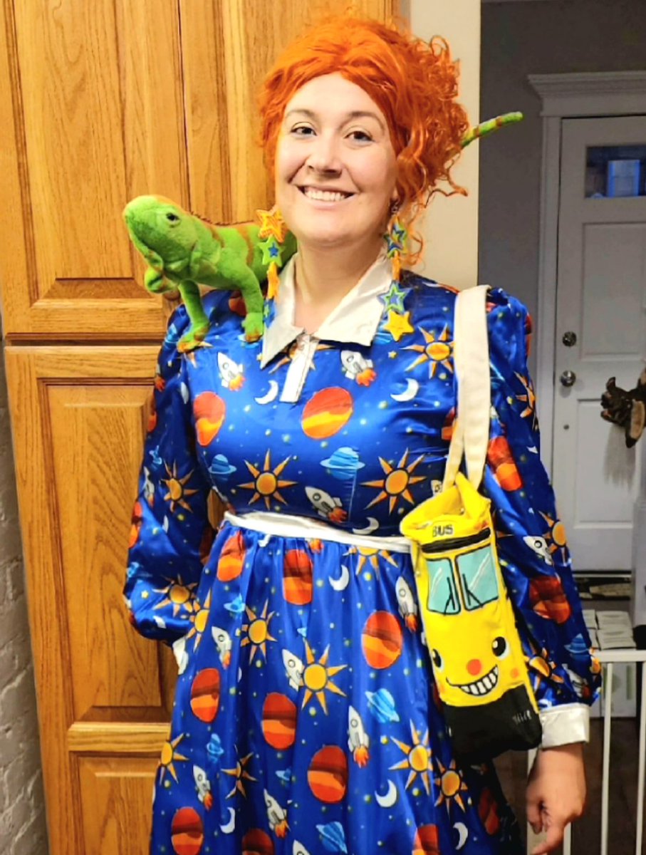 Mrs. Burnett's dog was very excited to meet Ms. Frizzle today! Here are some photos from this morning before the Magic School Bus took her to work at the OTES library! 🪄🚍🎃 #OTESLibrary #OTESPride #Halloween #MsFrizzle #MagicSchoolBus @Scholastic