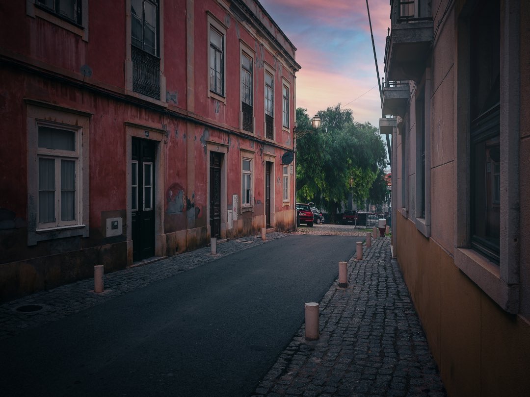 Lagos Algarve street architecture sun setting prior to the rain