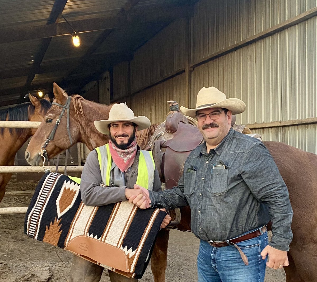 FrionaI's tweet photo. Congratulations to Victor Bracamontes for the Pen Rider of the month award at FI KS North Yard #2! Cattle Manager Gerardo Escobedo presenting. #FrionaBeef #Cowboy https://t.co/TC96KiIxvY