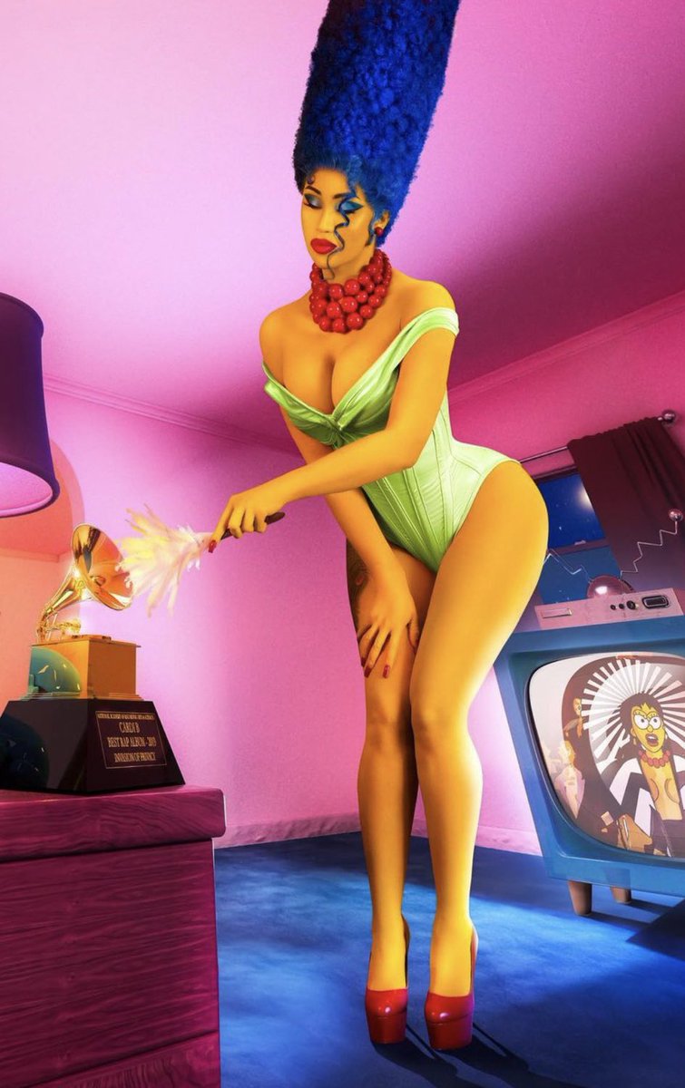 Cardi B dresses up as Marge Simpson for Halloween.
