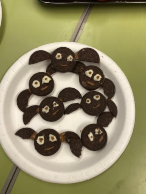 SfLBeeslack's tweet photo. Happy Halloween from our Learning Hub! Today we had fun making scary snacks at break: try to copy our spooky satsumas and beastly bats at home! https://t.co/7cubhrXBuS