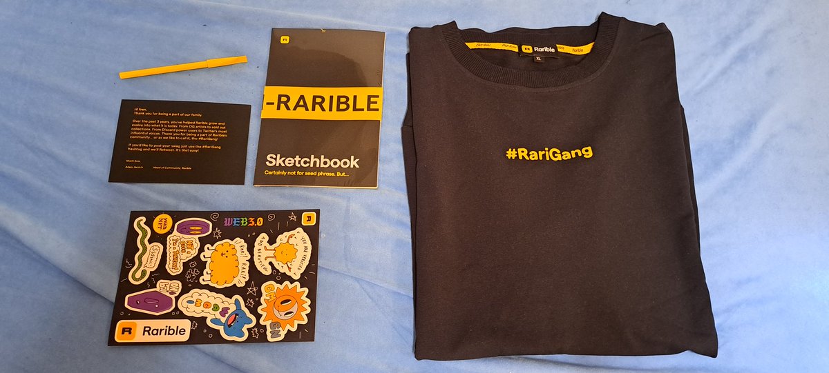 A $RARI care package just dropped in the mail! Top quality shirt, a sketchbook, stickers and a pencil, love it 😇 Thanks a million @rarible, really appreciate it. LFG
