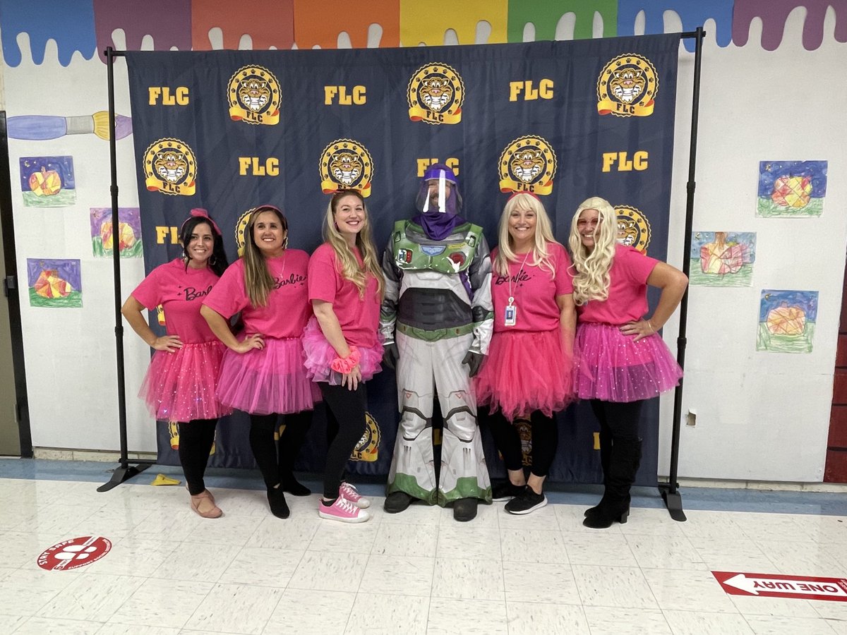 Toy Story at FLC today.The  Barbies hanging out with Buzz Lightyear.