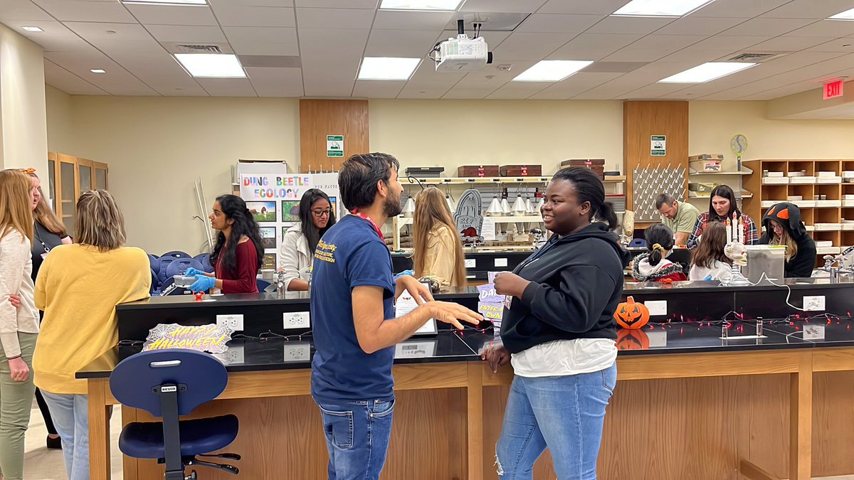 Kushal and Mellisa sharing spooky spotted lanternfly stories