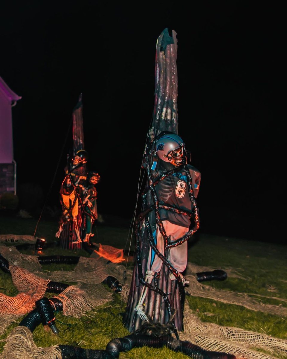 sportingnews's tweet photo. Myles Garrett went all out with his Stranger Things themed front yard, including a Baker Mayfield skeleton tied to a tree 💀😂 @Flash_Garrett 

📷: Danny Murtaugh/IG https://t.co/WazaAT9SqZ