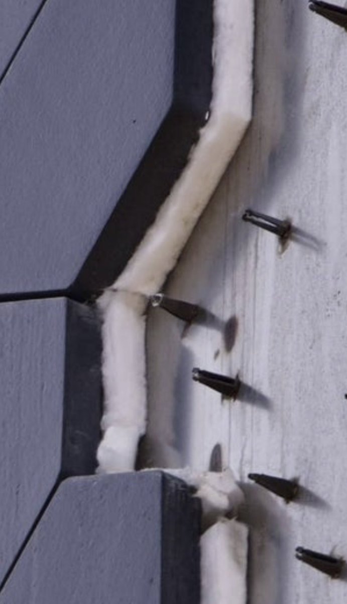 HowardFried's tweet photo. @SpaceX @elonmusk is there a way to bond the tiles to your cloth and not make contact with the mounting pylons? Similar to commercial meshed back tile. I assume all the vibration energy is transmitted through those little pylons.? https://t.co/xLCJujmCg1