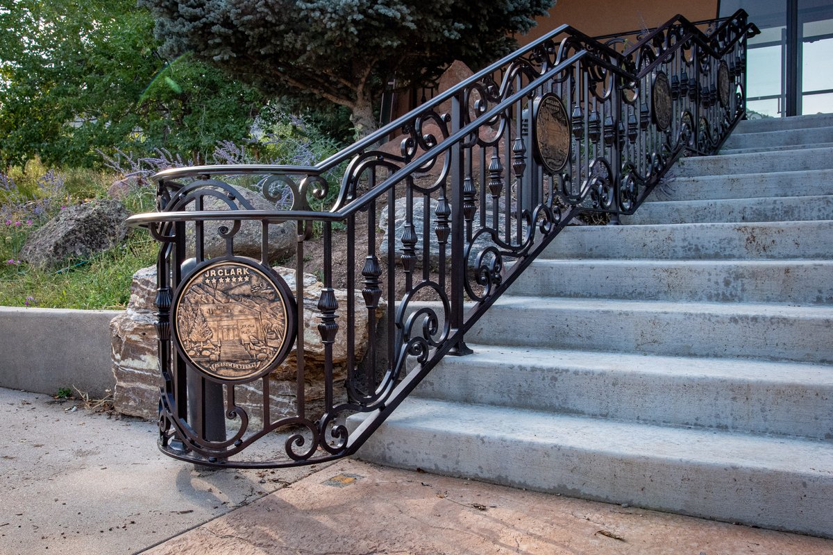 Traditional forged railing design in modern aluminum material with bold bronze medallions.
compassironworks.com 

#ironworks #compassironworks #railing #aluminum #bronze #traditionalbuilding #stairs #ironstairrail #traditionalbuilding