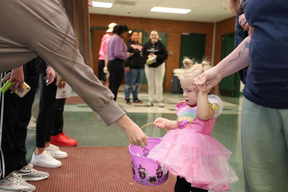 TRICK OR TREAT! The play school fall walk returned to Pattonville High School on Oct. 25 with students enrolled in Child Development II taking the boys and "ghouls" dressed in their Halloween costumes through the hallways to get treats from staff members.