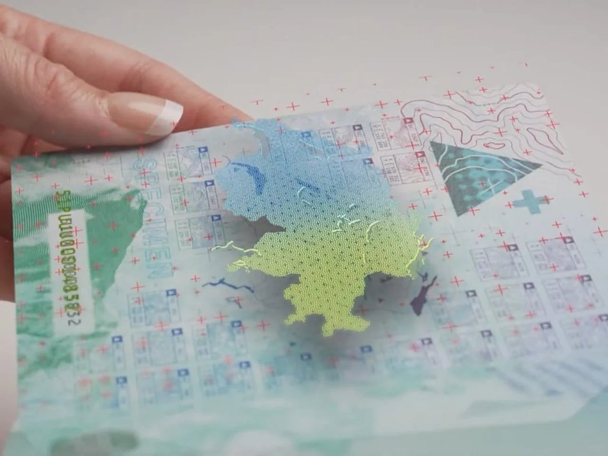 2022 redesign of Swiss passport retains iconic red color on the outside and now has maps inside 🤩
