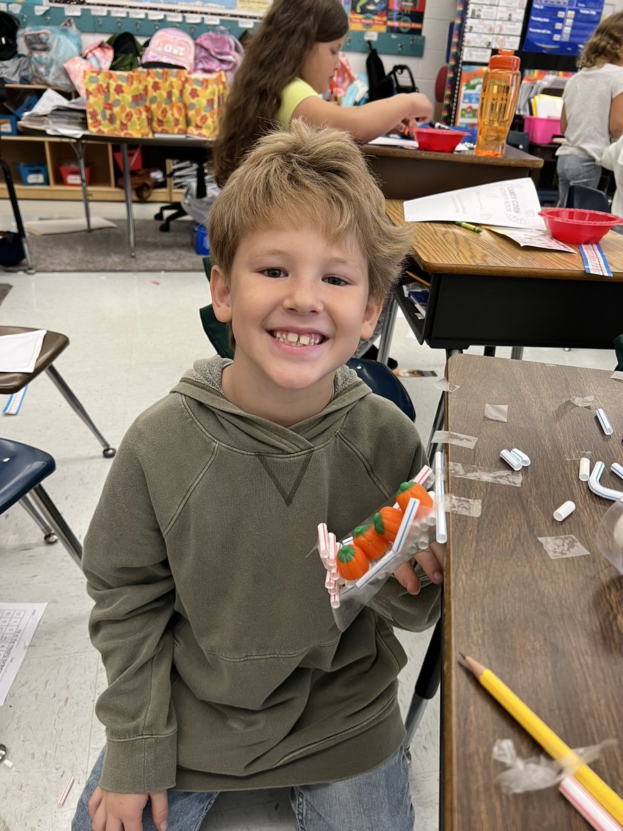 HayesEllen2021's tweet photo. My first graders @hmpearsonelem read Room on the Broom today using the @Novel_Effect, practiced our sequencing skills and then built brooms using straws and tape that would hold 5 pumpkin candy, one for each character in the book. @MarchinettiM @carlyandadam #stemstuff https://t.co/eKd6OpwR3y