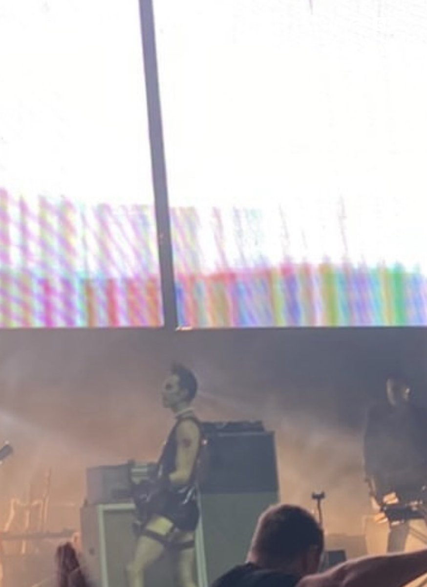 Stef as Frank n furter in fishnets and Brian is in a dress and pantyhose 😵#placebo