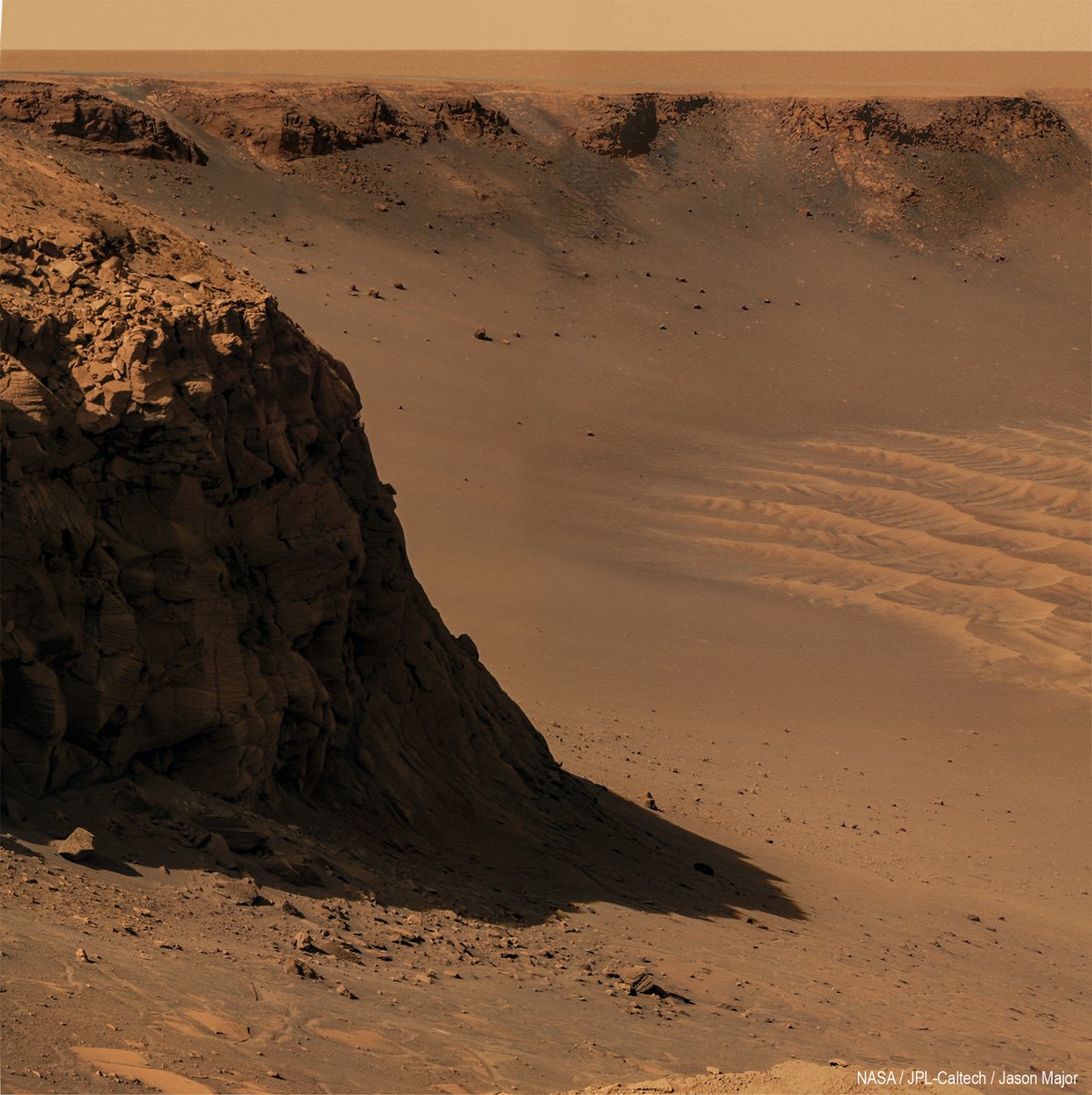 A view of the ~15-meter-high 'Cape St. Mary' layered outcrop located on the rocky western edge of the 730-meter-wide Victoria Crater on Mars, imaged by NASA's Opportunity rover on October 31, 2006 #OTD. Mosaic of pancam images adjusted to approximate natural color.