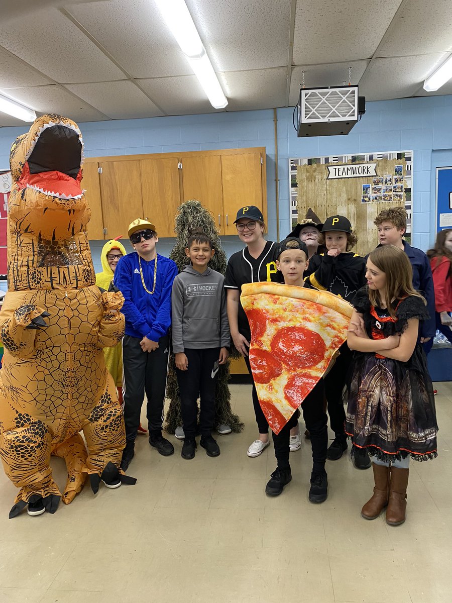 MissSibbick's tweet photo. When your kids give you the nickname “Big P” (a class joke about Pittsburgh Pirates) you have to cricut a jersey for Halloween! The reaction today was absolutely perfect. Happy Halloween Superstar 7s! I’m so proud to be your teacher. 🎃 https://t.co/VSW0TYfigH