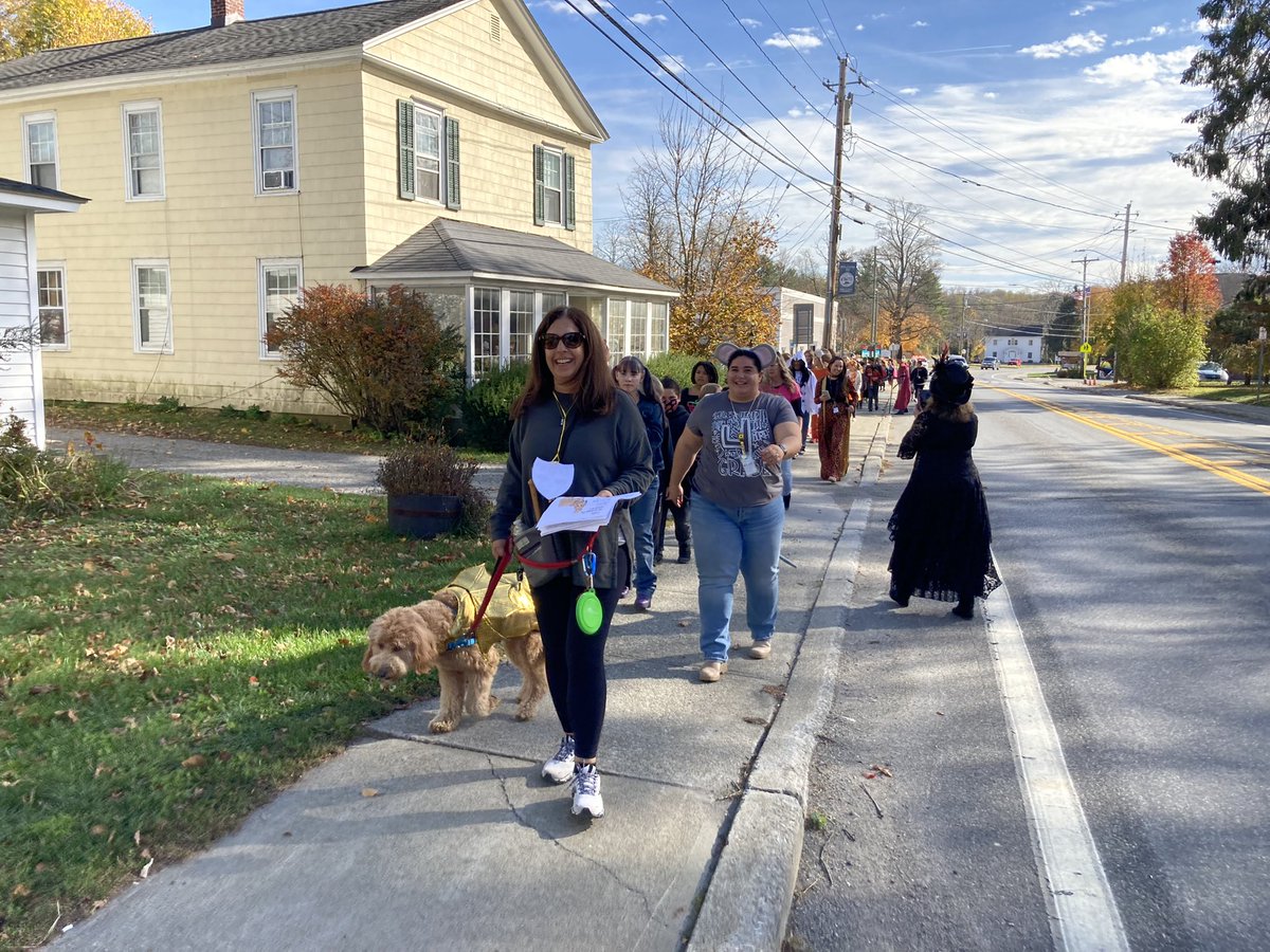 cquaranto's tweet photo. A perfect day for the DES Halloween parade! Led by none other than our favorite dog/dragon, Ivy! Thank you to the PTA for handing out goodie bags! #despride @DrFineDover https://t.co/FTbDOZ8yIp