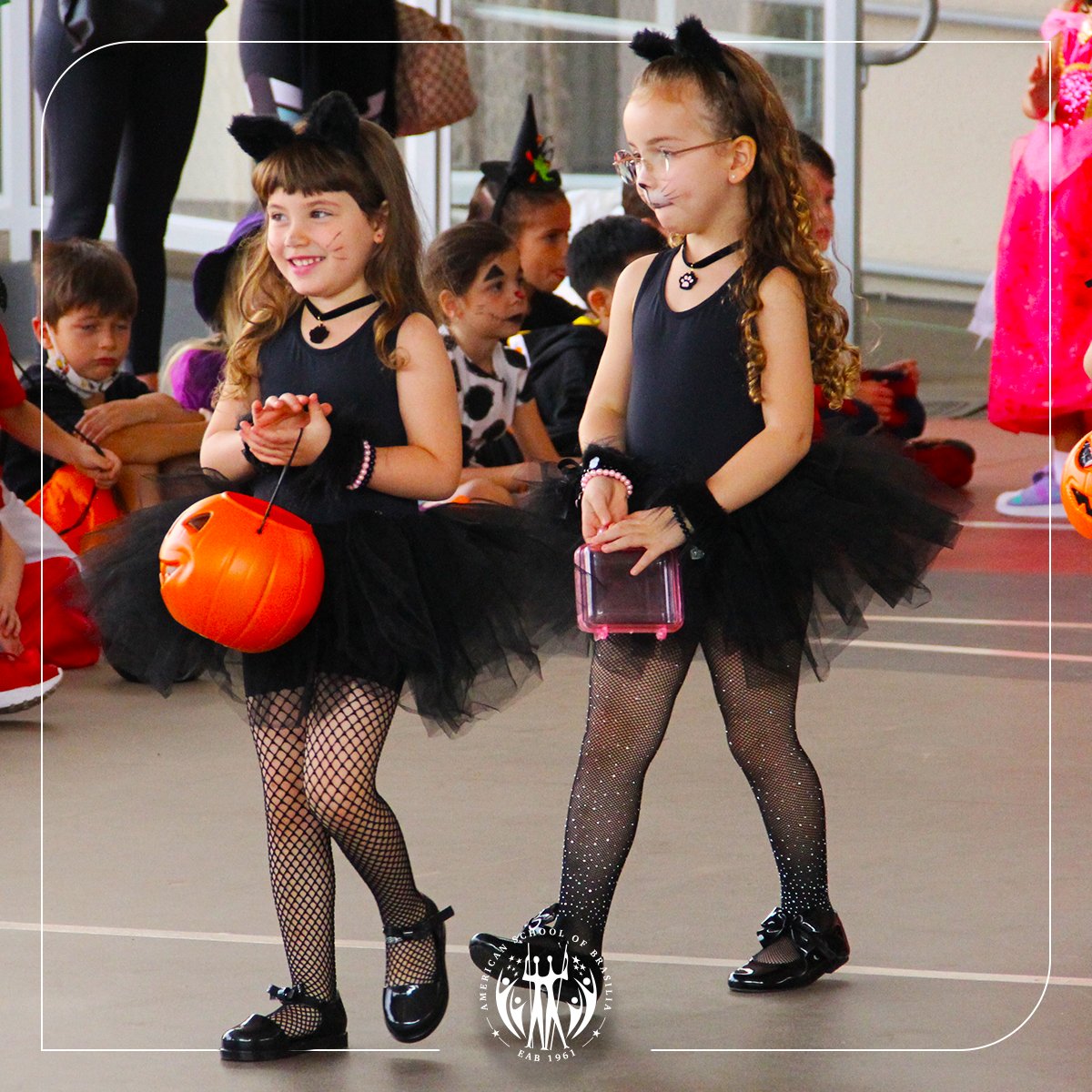 eab_school's tweet photo. K3 through Grade 1 students started their day parading, showing off their fantastic costumes. Afterward,  they went trick-or-treating at the Lower School offices. https://t.co/zEvAXF224k