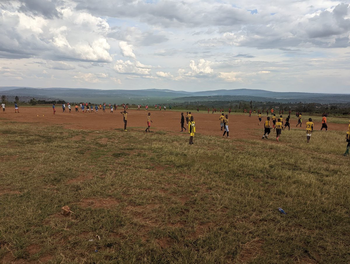 TranentFCYouth's tweet photo. Rwanda Day 3 - Visited two genocide memorials this morning, very emotional.

In the afternoon we headed to the hills to run a session for over 100 kids, aged roughly from 8-16. Amazing experience, kids play with smiles on their faces. @lylesdad @deanbev09 #rwandasco2022 https://t.co/FxPRv1mUxd