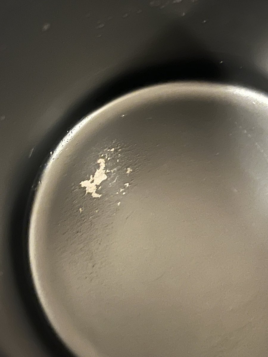 max_is_loud's tweet photo. @Ember_Tech This is my second Ember mug that started peeling like this.  I always hand wash it - what causes this, and how can I prevent it? I’m worried that I might be inadvertently ingesting flecks of whatever the black coating is made of - might be due for a new mug. https://t.co/U9eTQufATg