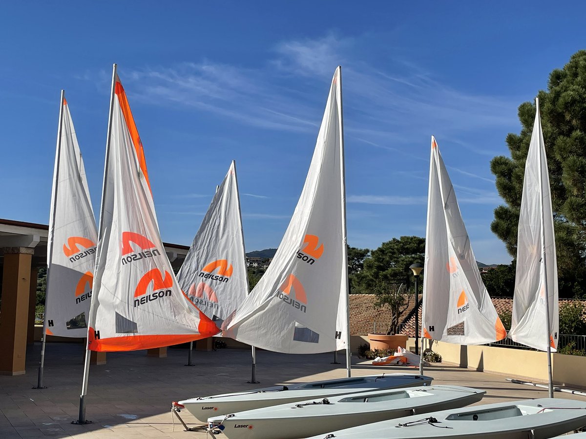 Where once there were terrace sun shades, now there are #dinghy sails, washed and hanging out to dry #handinhand (clew in clew) #bluesky <a href="/neilsonholidays/">Neilson Active Holidays</a>