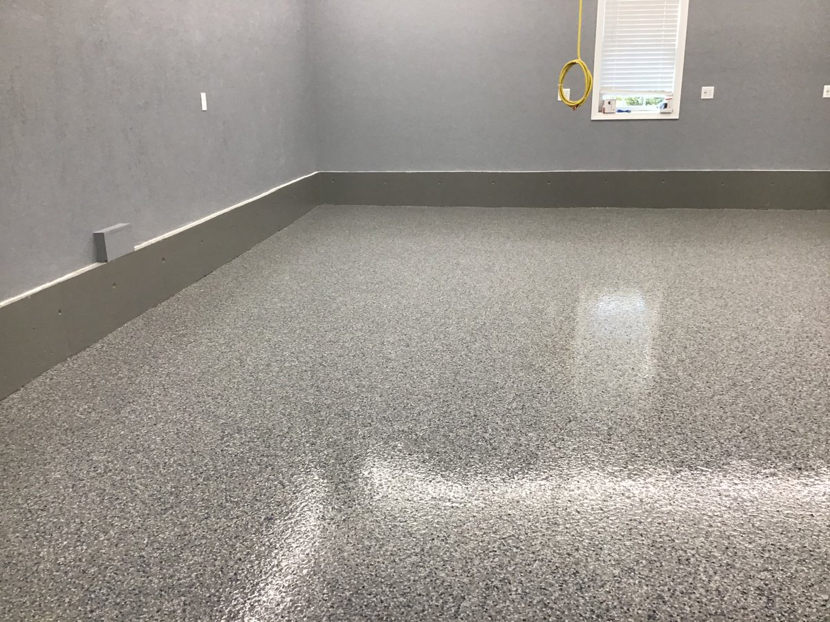 This Stoughton MA #garage got a quick makeover with a single broadcast using Dur-A-Flex, Inc. decorative flake #epoxy. 
#installation #commercialfloor #flakefloor #resinous  #seamlessfloor #decorativefloor #durablefloor #ma #construction #contractor #getfloored