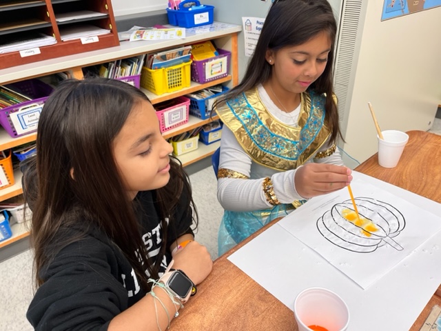 Halloween STEAM. Students combined a solid base (baking soda) and a liquid acid (dyed vinegar) to create a gas: carbon dioxide! <a href="/Hillside_Elem/">Hillside School</a>