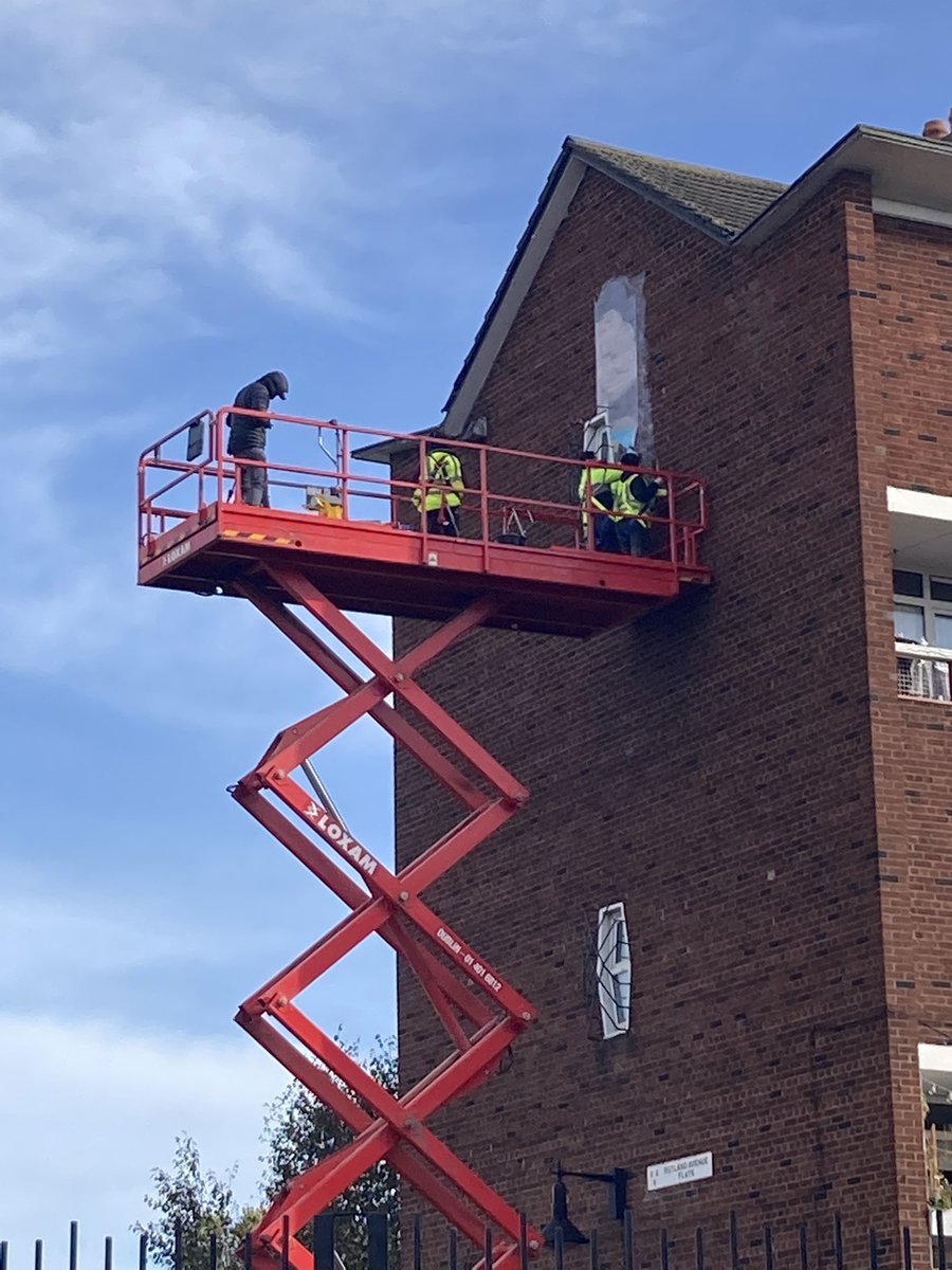 CrumlinAction's tweet photo. @sarahbrackenart has started to install her mural “The Weight” on Seagull House Crumlin Road, assisted by @hollypereira81 and @joecaslin … stop by if you’re in the area to see art in action @creativeirl @LabDCC https://t.co/0REJUmgFuc