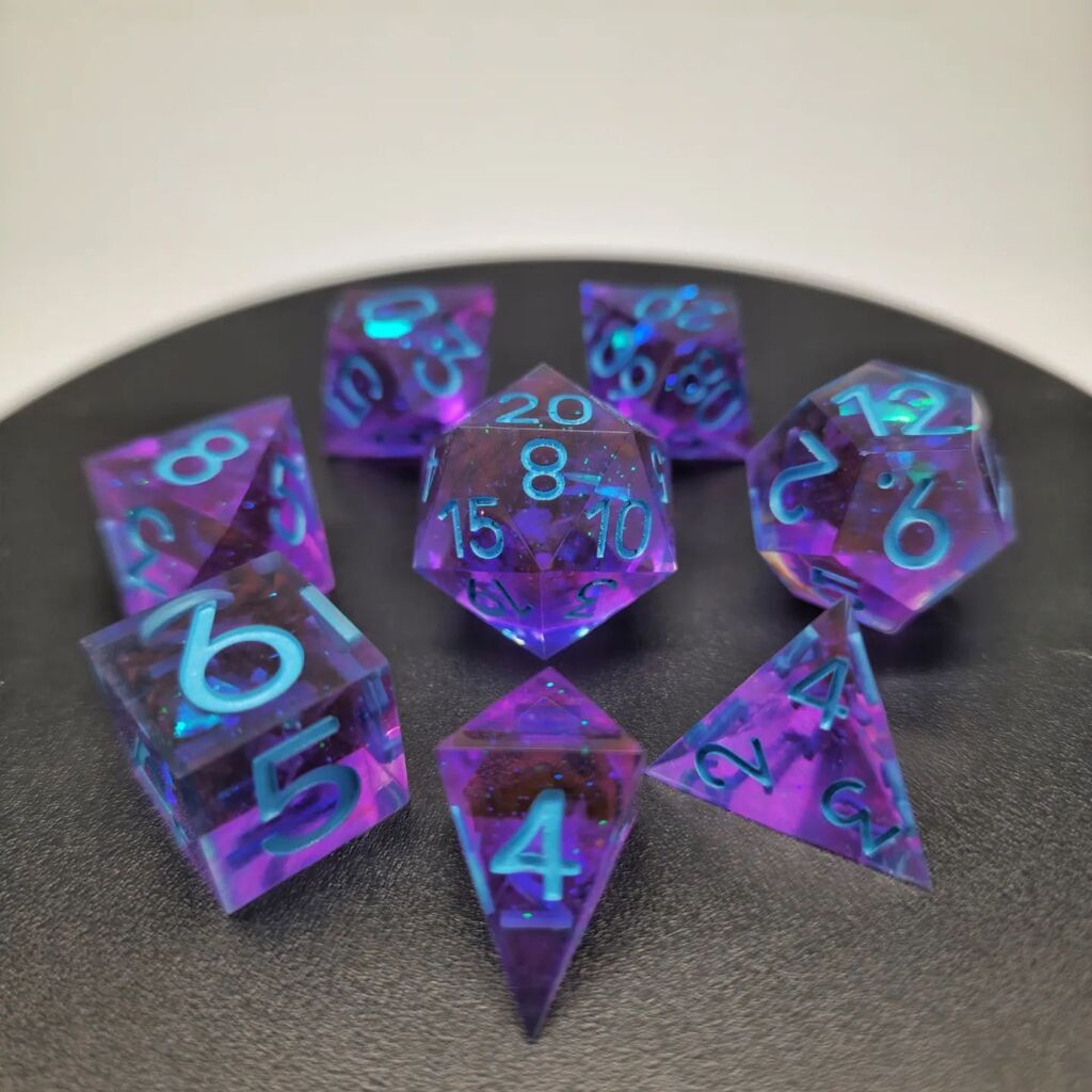 Vaesive_Plays's tweet photo. "AETHER BURST" 8-piece resin dice set with custom metallic teal ink requested by the buyer.
---
#dicegoblin #dice #dicemaking #diceart #resindice #resinart #homemade #ttrpgdice #dnddice #dungeonsanddragons #rollforinitiative #forbiddencandy #handmadedice #shinymathrocks https://t.co/K8f5U0M5pY
