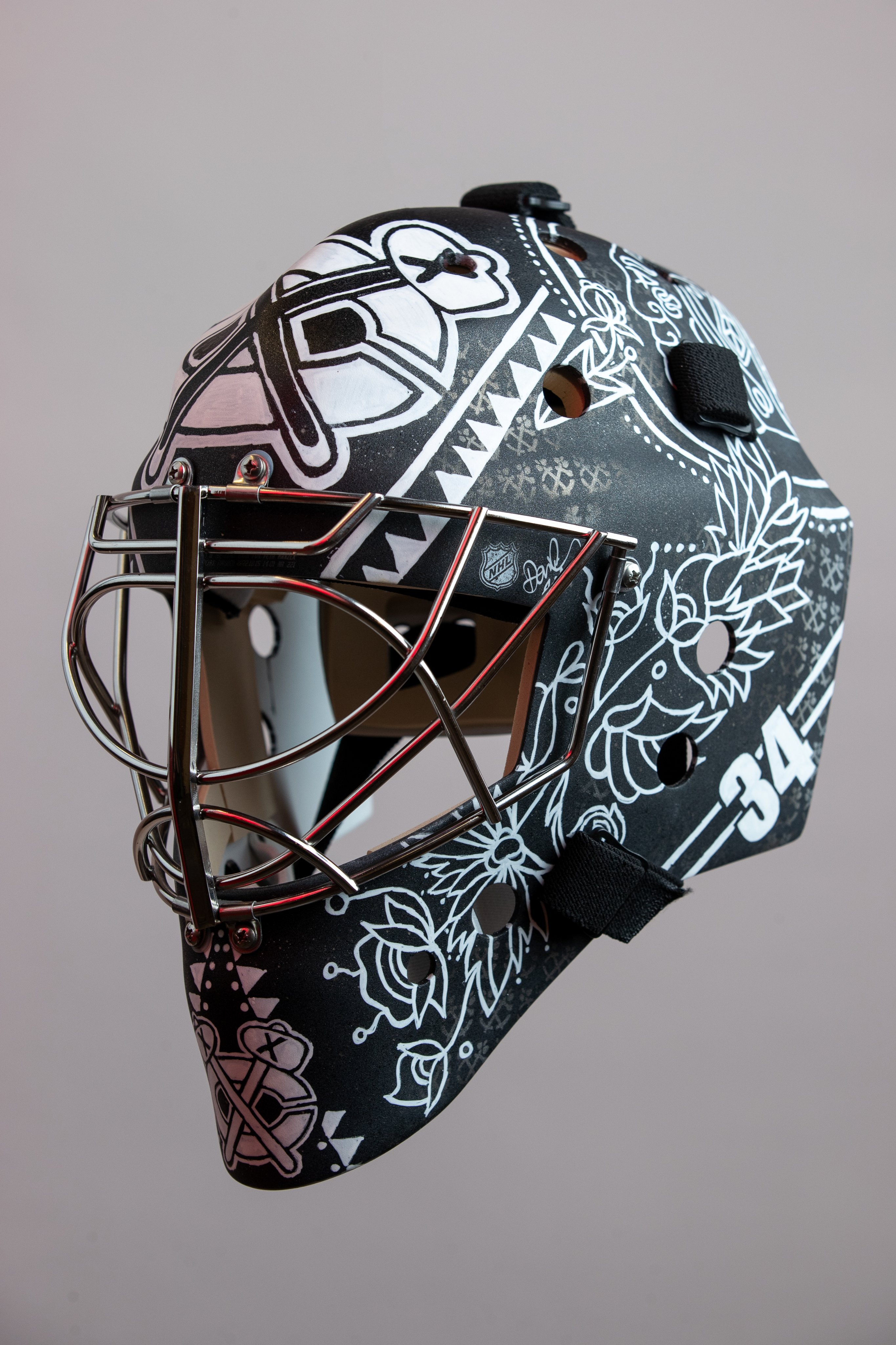 Ojibwe artist designs Chicago Blackhawks helmet for new goalie