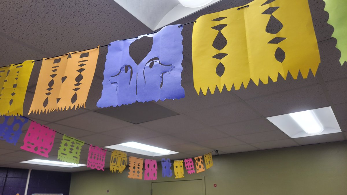 WMESDrama's tweet photo. After learning about the history and traditions of #DiaDeLosMuertos in #ArtClass and #DramaClass, our #WMEStars designed and cut Papel Picado to display for the #holiday. #ArtsIntegration #WeAreTheArts #FineArtsMagnet #ycsd https://t.co/NhJdfyOWM3