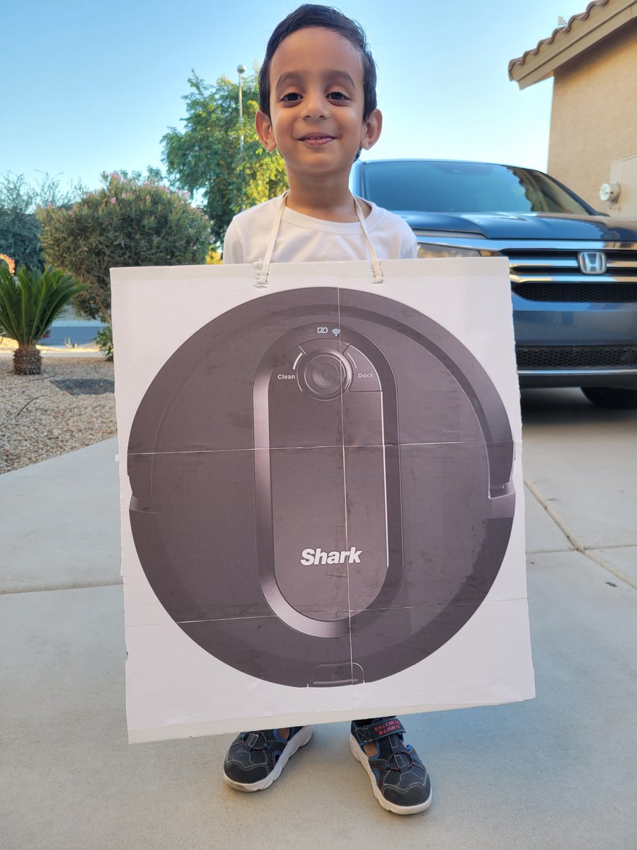 Cleaning up the candies in the neighborhood in his <a href="/SharkHomeUS/">Shark Home</a> #Halloween costume