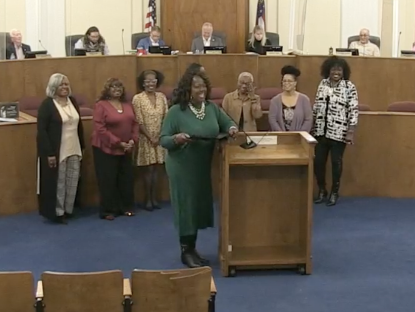 liz_lines's tweet photo. Commissioner Elaine Lucas reads @MaconBibb proclamation for declaring Nov 1 as #RetiredEducatorsDay with 141+K retired educators in Georgia. These 7 ladies worked 213 years!!! Not including educator Lucas. @maconnewsroom @mercerccj https://t.co/6HpnmINppr