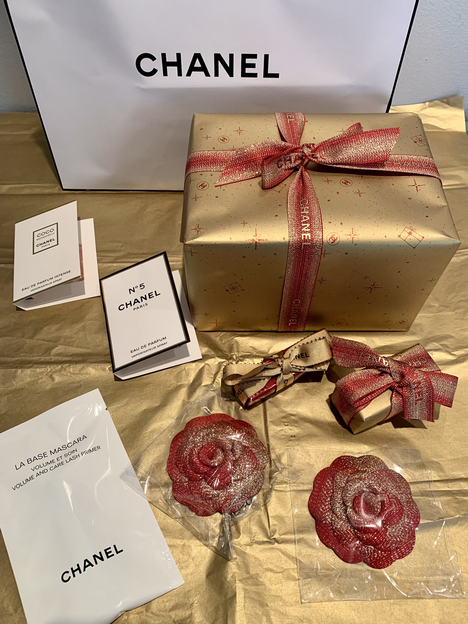 Cookie Gigan on X: Christmas came early! This just arrived from Chanel  Beauty at @HoltRenfrew Bloor Street. I love this years Holiday Camellia and  the Holiday wrap and ribbon is stunning.Reveal will