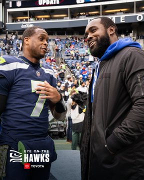 Geno Smith with Kam Chancellor.