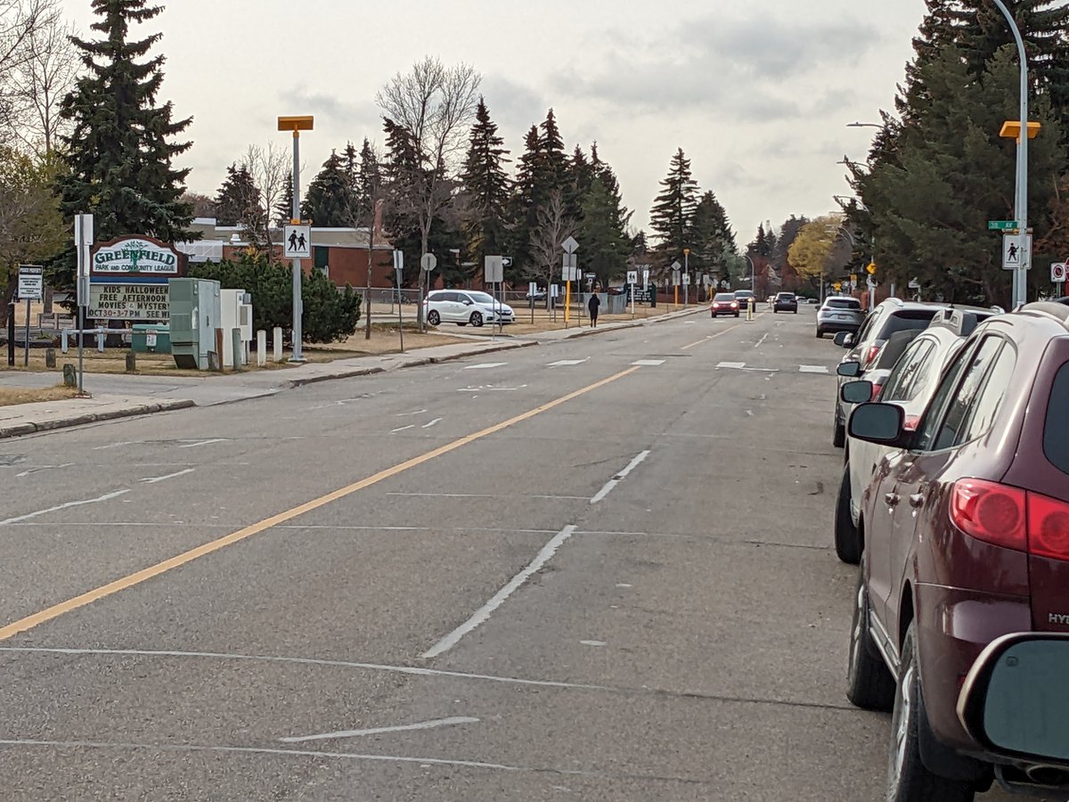 northcycler's tweet photo. Today cycling beside parked cars. Residential, City bike route, school zone. ½ ton behind. Cars from other direction clear, then ½ ton accelerates wildly, aggressively roars past <1m from me when other lane has plenty of room, speeding. #weapon
@michaeljanz @_timcartmell #yegbike https://t.co/MFRyg5HynX