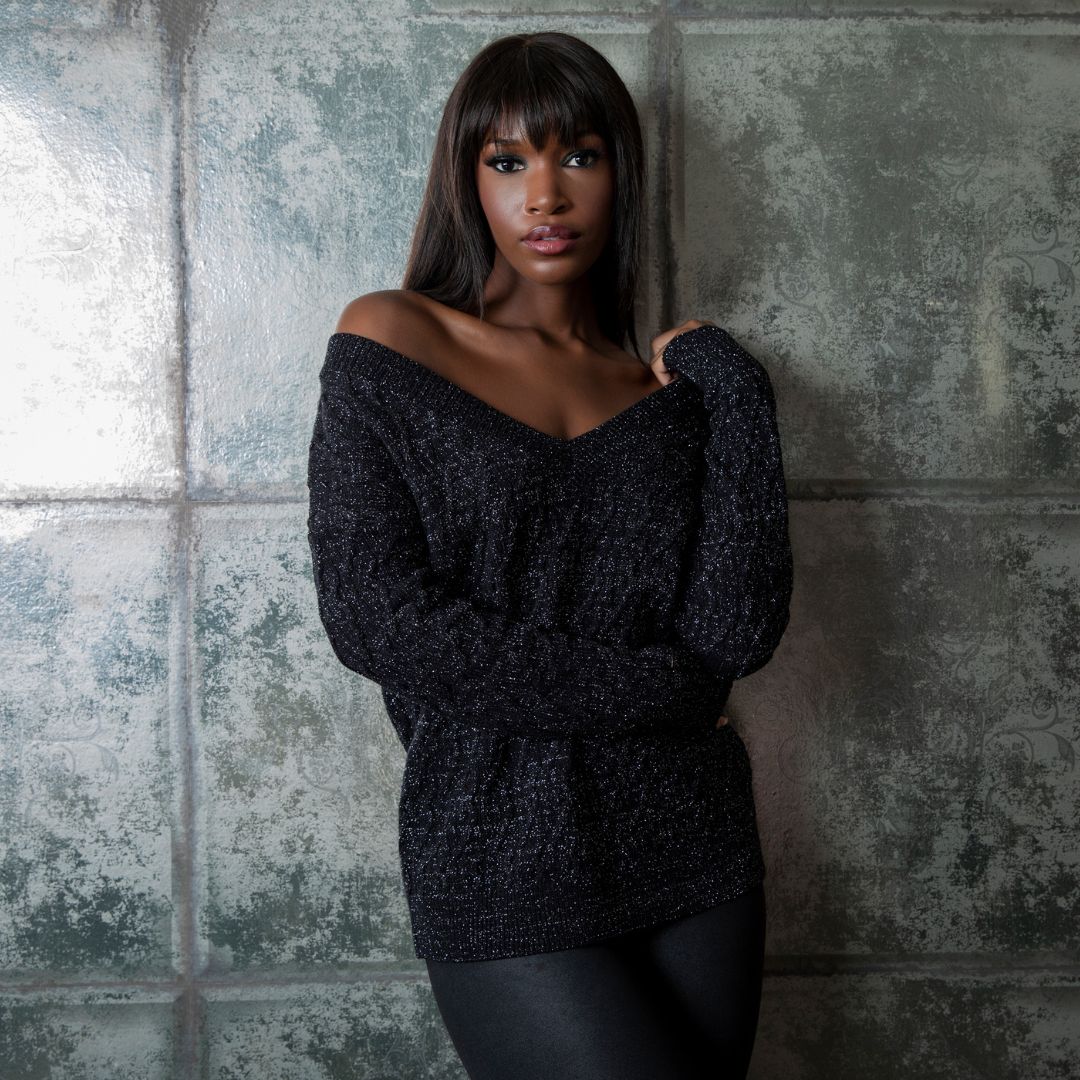 Sexy sweaters for the season. On or off one shoulder this deep V pullover sweater will add some sass to your style with a bit of lurex sparkle throughout.  Perfect for an evening out. 
#holiday 
Belldini.com