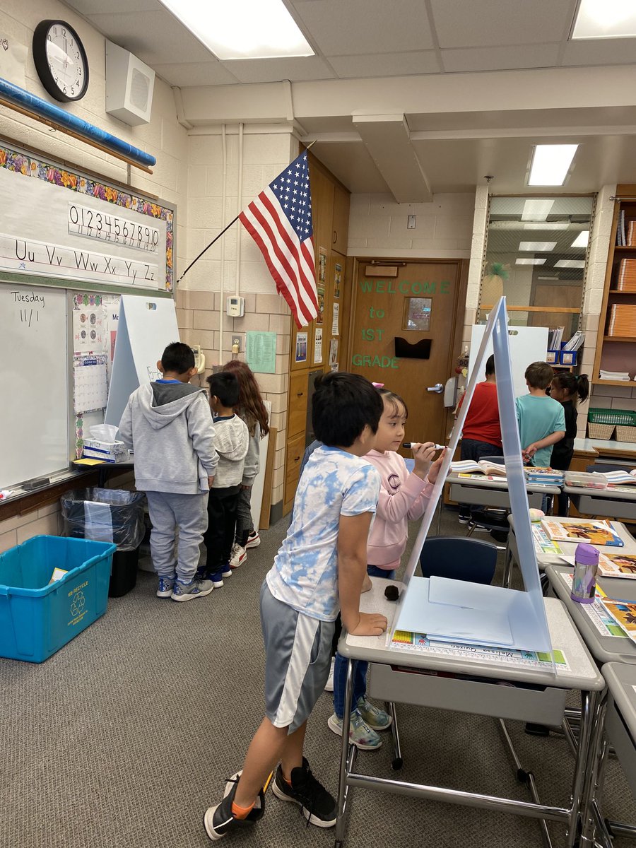 TeWestover's tweet photo. 1st graders in action @Howard Elementary solving story problems using vertical boards. Awesome mathematicians!!! https://t.co/F3eoU7W6rU