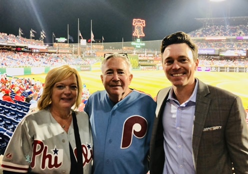 PatGallenCBS3's tweet photo. My parents made it to game 3.
(My dad is wearing a throwback with "Gallen 99" on the back. Solid dad move.) https://t.co/PA40eAflJy