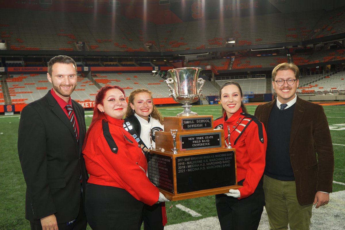 DebTobar's tweet photo. So #MineolaProud of Adam and the Mineola Marching Band for winning first place in their division at the @NYSFieldBand state championships this weekend in Syracuse! ❤️🤍🖤 https://t.co/iG3TfGpook
