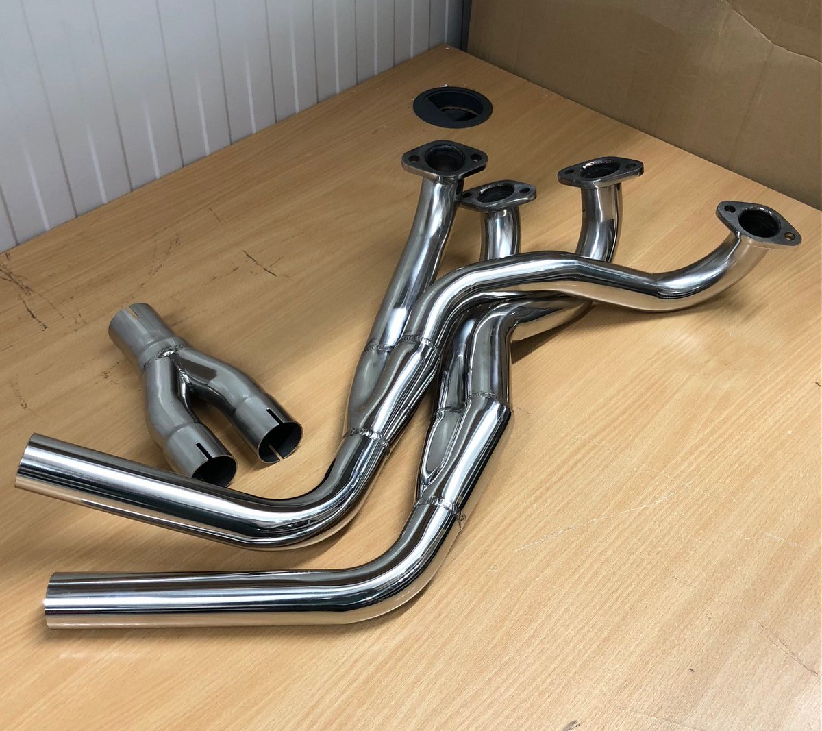 Preparing to send out a polished steel, large bore manifold for an Elan to another happy returning customer. parts.classicteamlotus.co.uk #elan #lotuscars #classiclotus