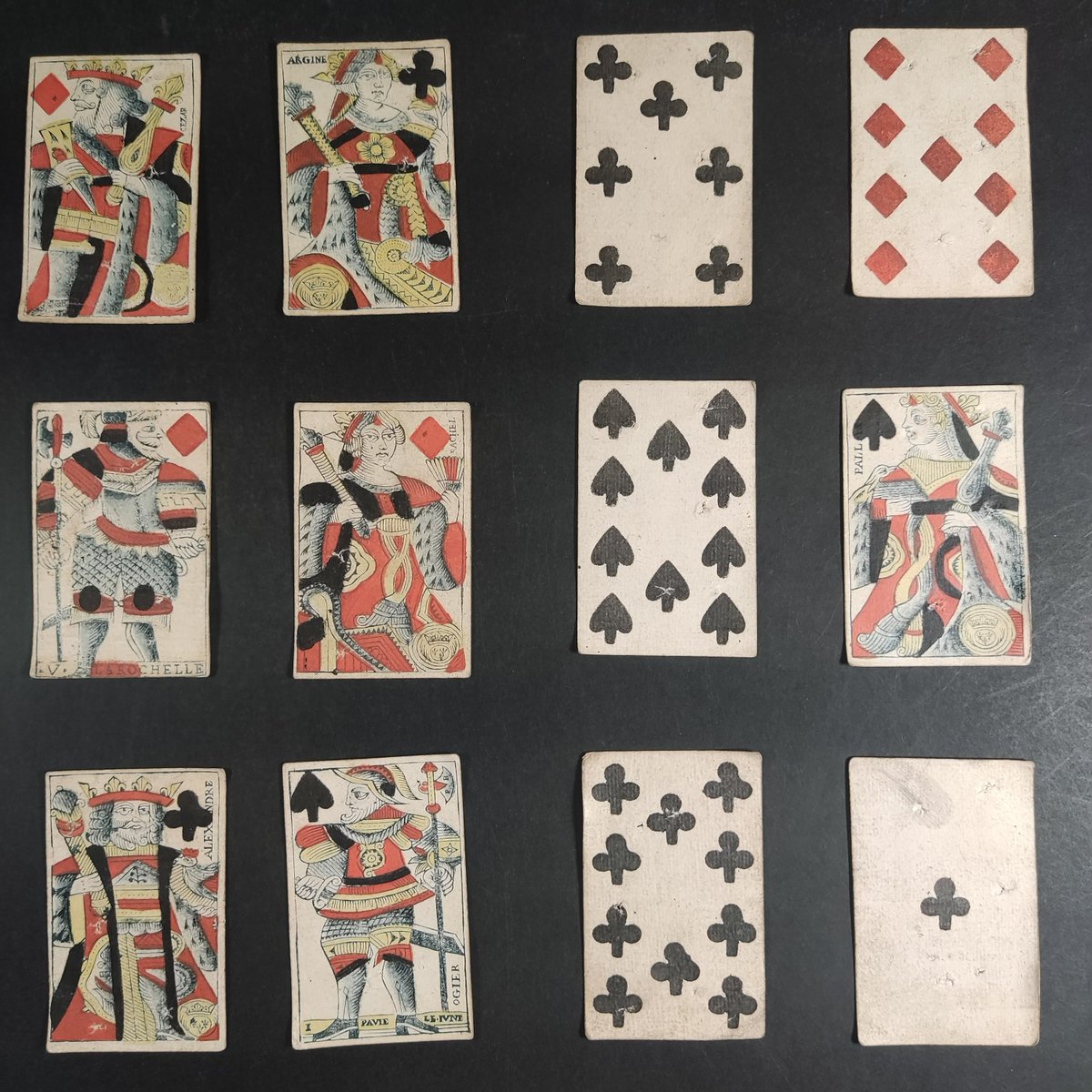 Twelve playing cards that an English privateer seized from French ships that were smuggling brandy in 1744. Sets of cards like these are common in the Prize Papers, but we never have a full deck. Why should this be the case? It turns out that they were not used for gaming /1
