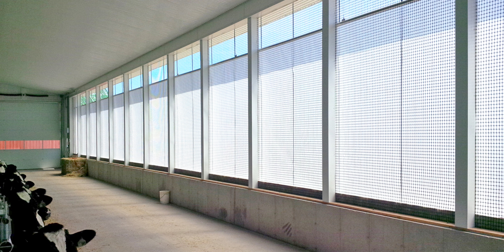 Roll-A-Way Curtain System maintains barn environment for optimum performance through all seasons. Unique curtain design keeps fabric tight in all positions opened &amp; closed. Permanent mounted floating bottom aluminum roller tube in standard fabrene fabric 9oz 

#naturalventilation