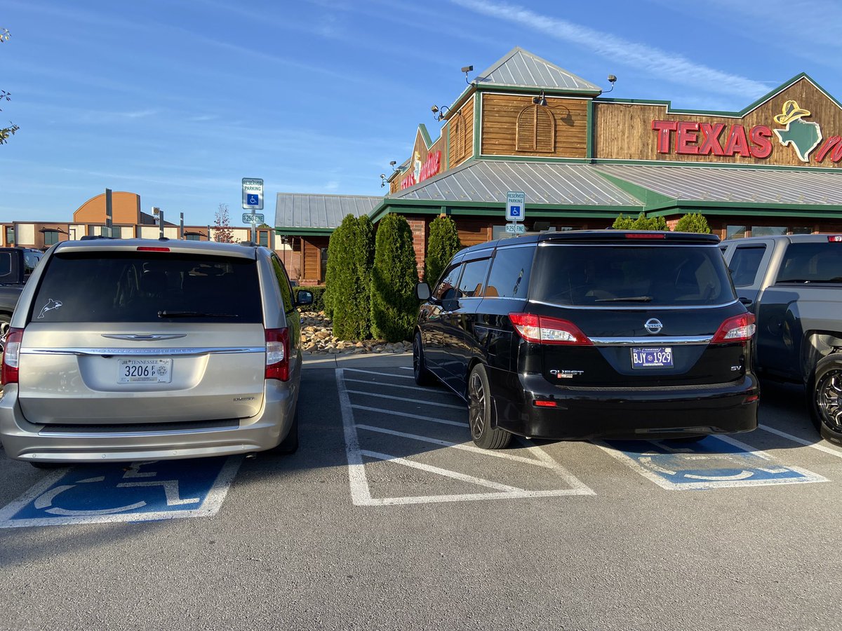 People that park like this black suv are just jerks. Please dont park on the crossed lines, wheelchair vans cant use their ramps if you do. #parkingfail #badparking #jerk #asshat