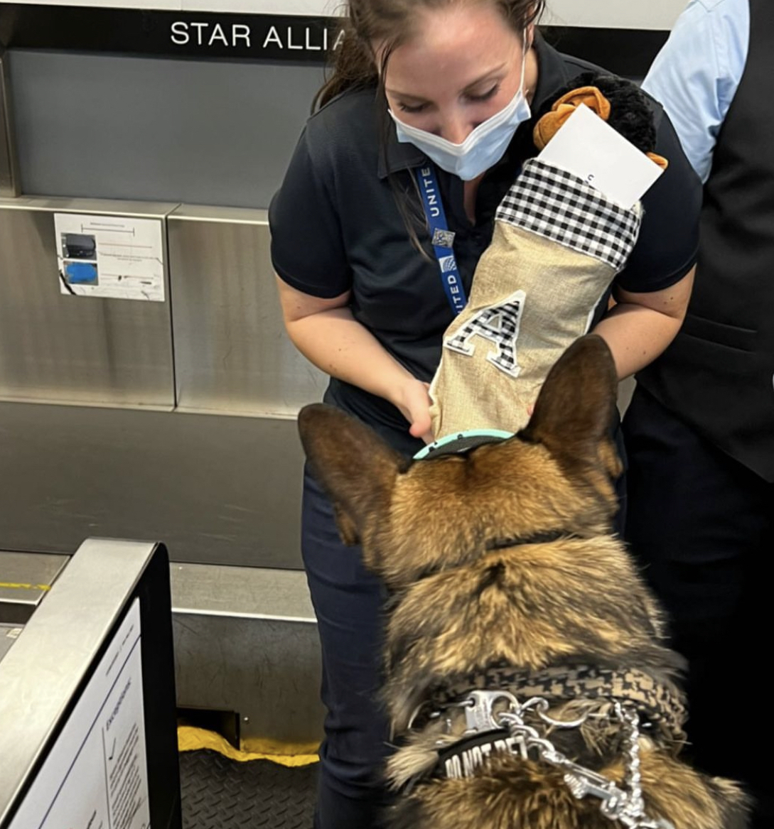 Our team in Savannah, GA (SAV) welcomed @k9arlo. Arlo was injured while on active duty earlier this year. He has since retired and was adopted by his handler, Dep. McCoy. They enjoyed surprise holiday treats and a game of fetch at the SAV baggage claim. #WeAreUGE | #UGEProud