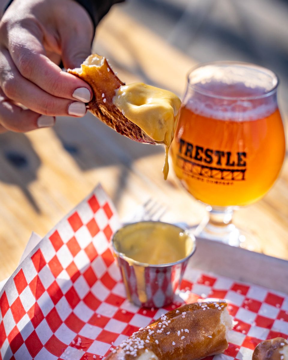 It's Happy Hour at Trestle! Every Tuesday, Wednesday and Thursday afternoon from 2pm-5pm we have Happy Hour Pricing! 18oz and 12oz pours of all our beers are discounted AND our pretzel, edamame, and creamy cheddar and spinach dip are all 50% off when you buy a beer.