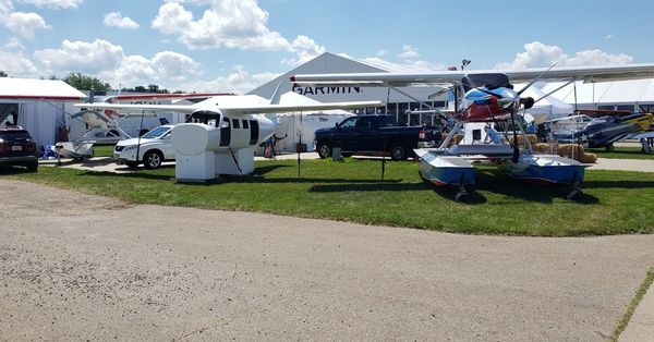 compairaviation's tweet photo. We're almost done setting up at @eaa #airventure2022. Swing by booth 369 to see the progress on the new #compair6.2, and find out why we have a Cessna 206 floatplane in our booth.
#osh22 #airshow #compair #eaa #oshkosh #cessna #floatplane #compair7 #superfloats #compwing https://t.co/PsjLLg8aW2
