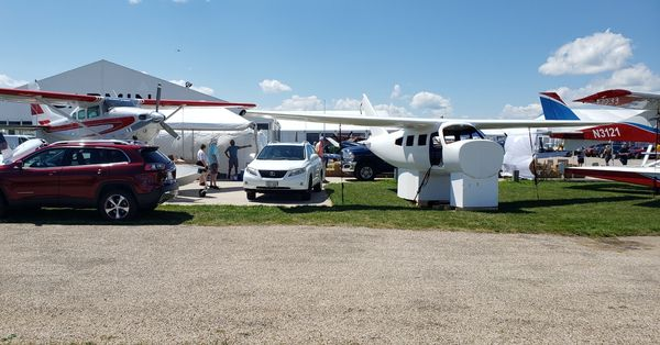 compairaviation's tweet photo. We're almost done setting up at @eaa #airventure2022. Swing by booth 369 to see the progress on the new #compair6.2, and find out why we have a Cessna 206 floatplane in our booth.
#osh22 #airshow #compair #eaa #oshkosh #cessna #floatplane #compair7 #superfloats #compwing https://t.co/PsjLLg8aW2